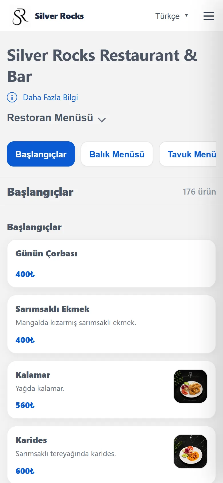 The same restaurant menu in Turkish on a phone, showing the Başlangıçlar category